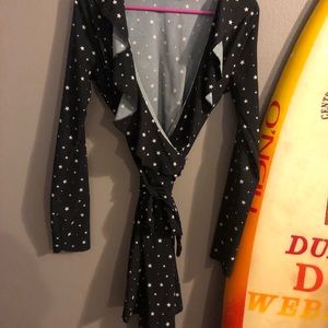 Hire and black star wrap dress